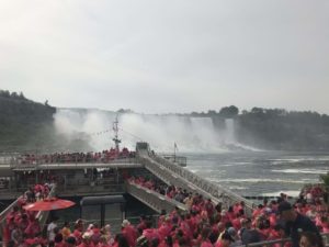 Travelers lining up for a Hornblower cruise close to the falls