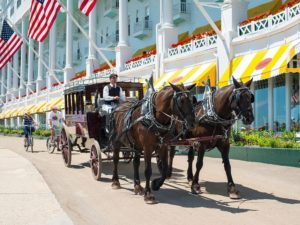 Horse-drawn carriage in front of the Grand Hotel at Mackinac Island